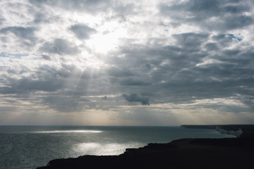 Fototapeta premium Sun bursting through clouds