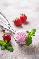 Ball of strawberry Ice cream in scoop