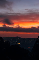 city at dusk photo from the mountain