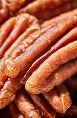 Close up picture of dried pecan nuts, selective focus.