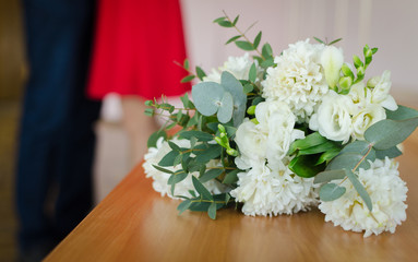 beautiful modern wedding bouquet on white table