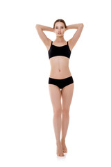 Fototapeta na wymiar woman with perfect sporty body in black lingerie