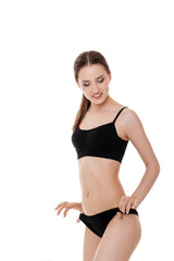 Fototapeta premium woman with perfect sporty body in black lingerie