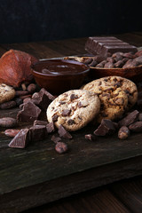 Chocolate cookies on wooden table. Chocolate chip cookies shot.