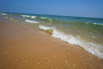 Lonely Atlantic beach in spring in Portugal with light swell
