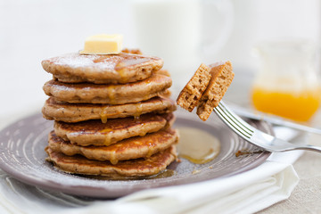 Pancakes with milk and honey for breakfast