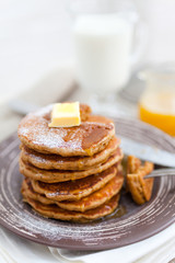 Pancakes with milk and honey for breakfast