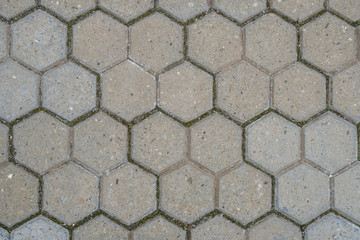 Stone pavement texture. Abstract background of old cobblestone pavement