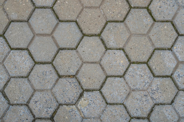Stone pavement texture. Abstract background of old cobblestone pavement