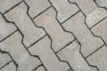Obraz premium Stone pavement texture. Abstract background of old cobblestone pavement