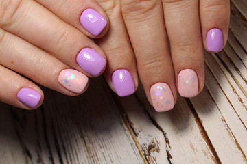 pink manicure with a design