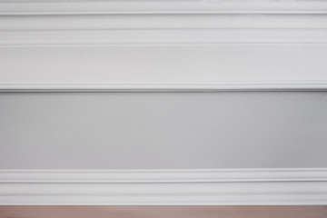 Ceiling moldings on a white surface. Details of the ceiling