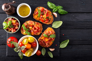 Italian bruschetta with chopped tomatoes and basil   on grilled crusty bread.