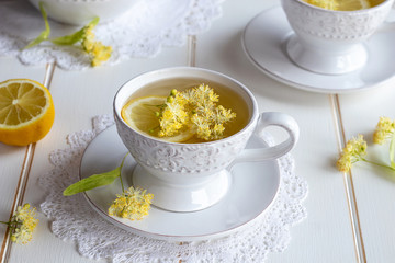 Linden flowers in a cup of herbal tea