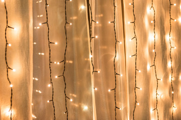 Glowing garlands in the interiors. Luminous texture.
