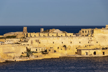 Fototapeta premium View of part of the Ricasoli Fort, Kalkara from the Lower Barakka Gardens in Valletta, Malta