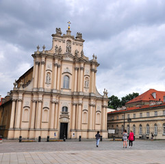 Fototapeta na wymiar Beautiful baroque church in the street of Warsaw, Poland