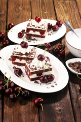 Chocolate cake with cherries and whipped cream. Black Forest cake
