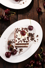 Chocolate cake with cherries and whipped cream. Black Forest cake