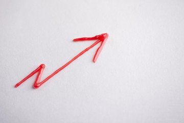 red arrow on white background