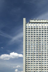High house against the background of the blue sky