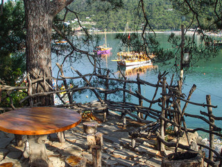 Wooden table on the observation deck over the sea
