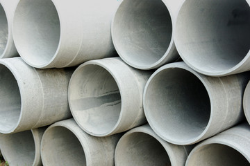 Close up concrete, cement pipes stacking,  pattern background. concrete pipes for irrigation