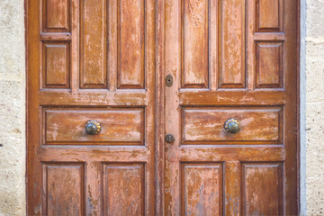 old wooden door in antique house close-up