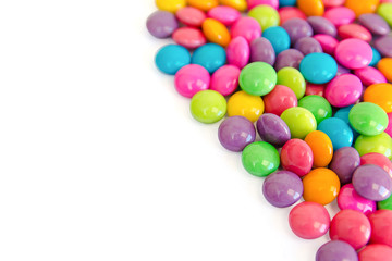 colorful chocolate coated candy isolated on white background. with copy space