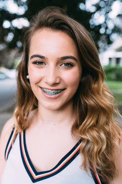 A young teenager in the city in the summer