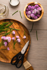 Overhead photo of Chives Blossoms being cut