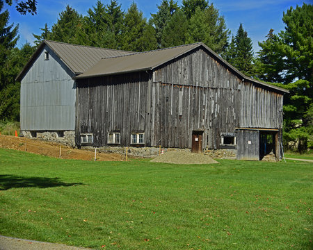 Well maintained old wood barn