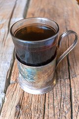 Tea in the Russian cup holder.