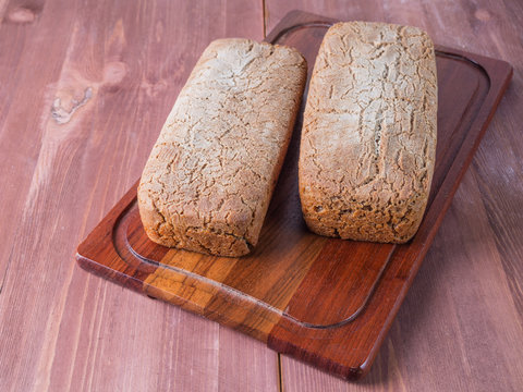 Baked bread on a cutting board