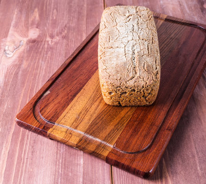 Baked bread on a cutting board