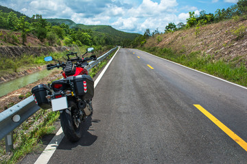 Traveling on a touring motorcycle on the mountain roads.