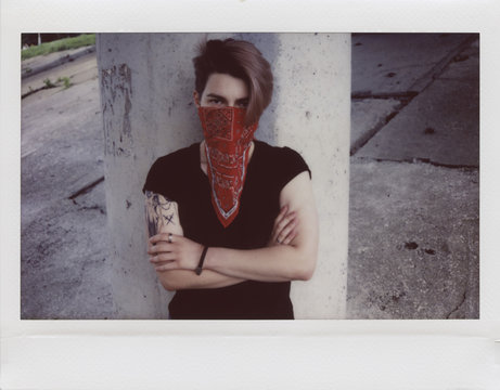 tomboy covered face with red headscarf