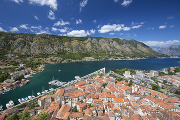 Naklejka na ściany i meble Old walled city of Kotor and surrounding mountains and bay.