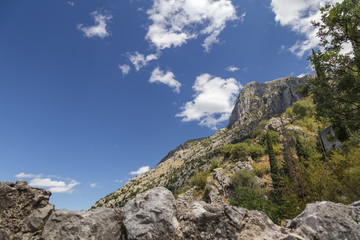 Fototapeta na wymiar Wide angle view of Pestin Grad, a rocky ridge above Kotor, Montenegro.