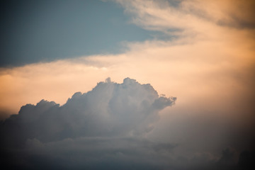 Close-up of cumulus clouds forming with silver lining