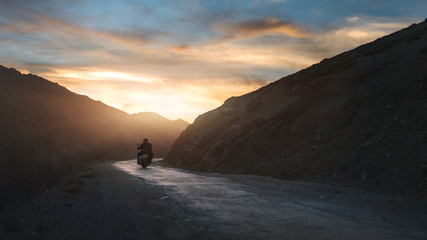 Biker on a mountain road