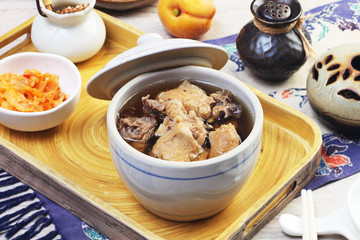  Black garlic chicken soup on the table 