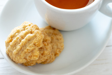 Cereal cookies and tea, selective focus.