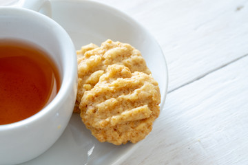 Cereal cookies and tea, selective focus.