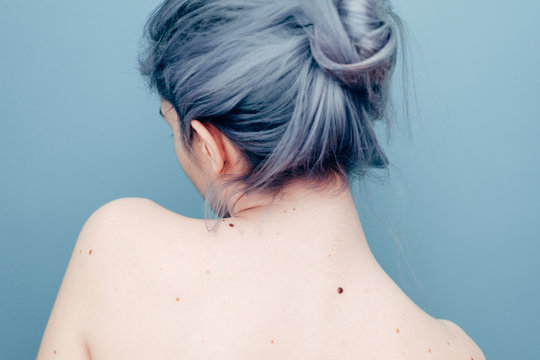 Delicate Pale Young Woman With Blue Hair