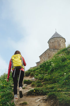 Young woman hiking in the mountains