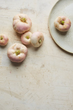 Family of pan cai turnips and a ceramic plate