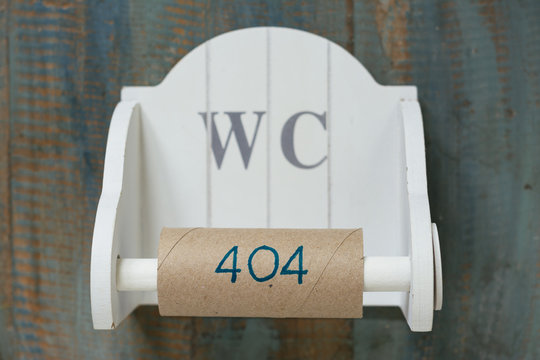 Empty toilet roll with 404