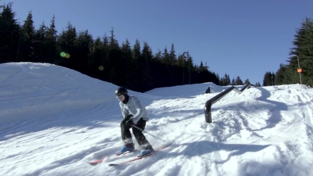 Skier Hitting a Rail