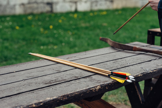 Arrows on a table at an arhery range